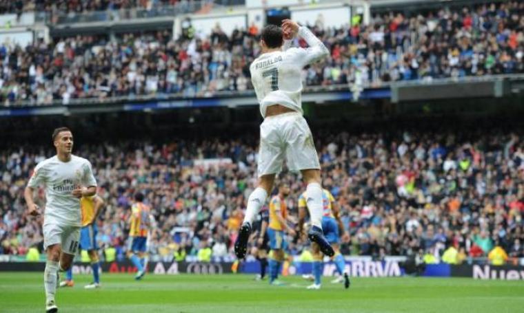Selebrasi Cristiano Ronaldo usai cetak gol ke gawang Valencia. (Dok:net)